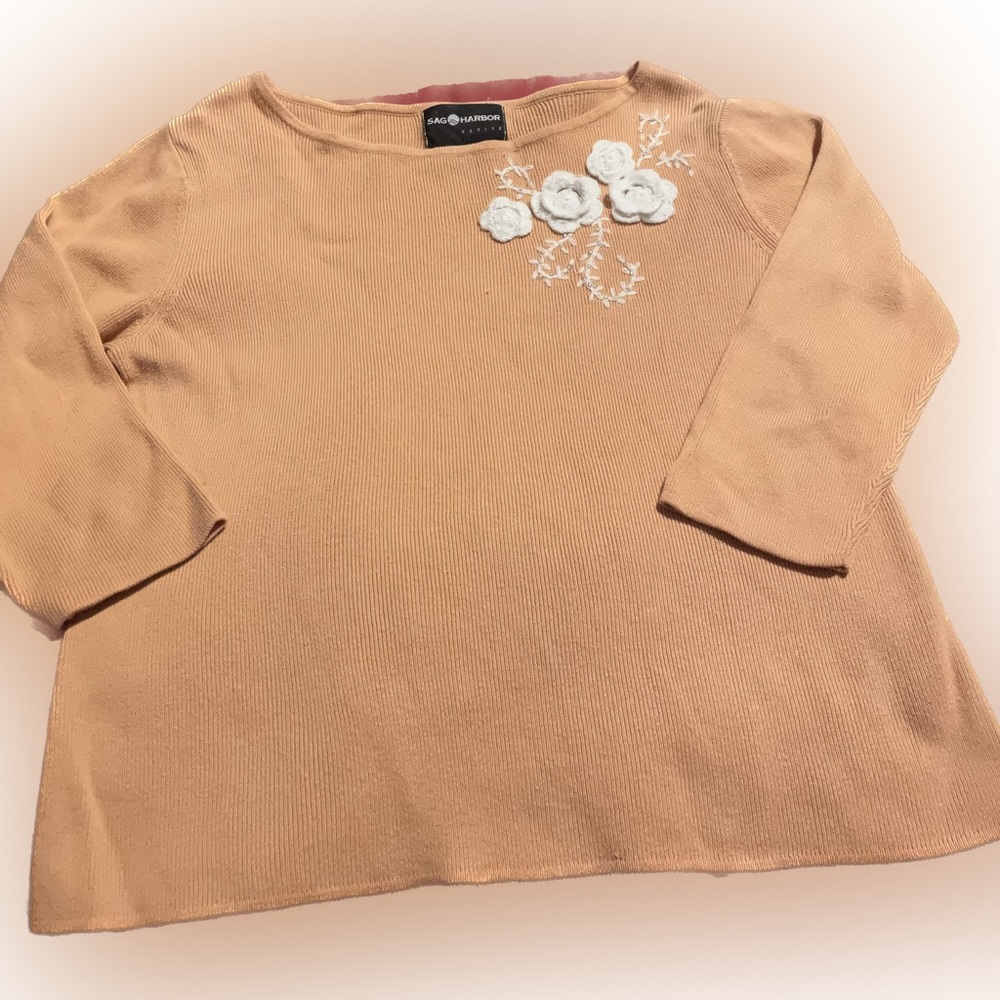 Sweater with crocheted flowers and beads